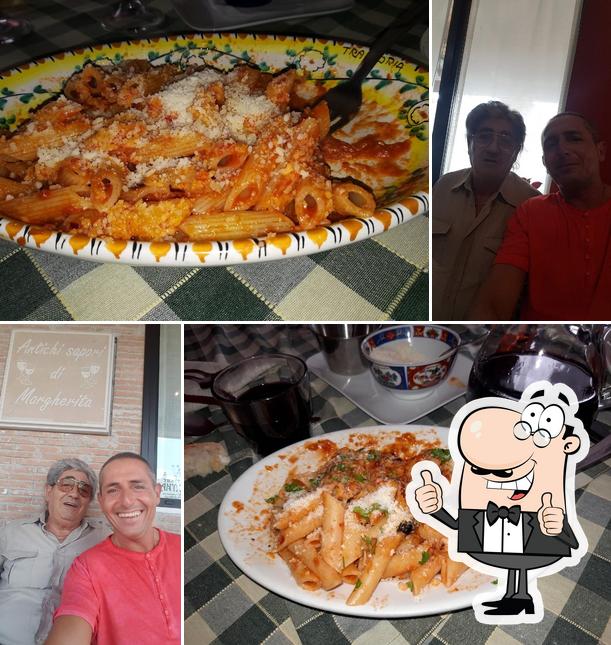 Ecco una foto di Trattori Antichi Sapori Di Uva Mena