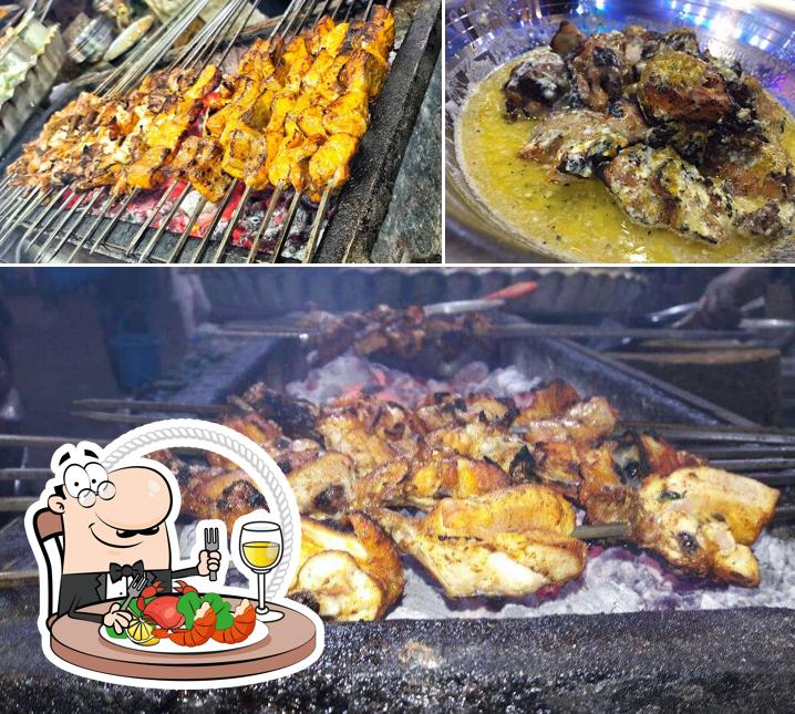 Get seafood at Aslam Chicken