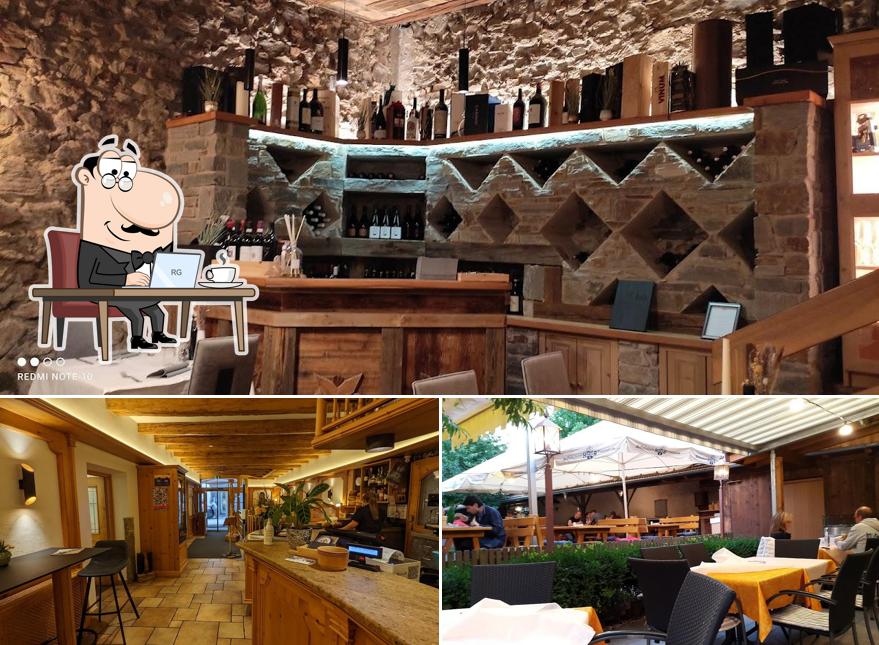 Siediti a un tavolo di Ristorante Pizzeria Zur Traube