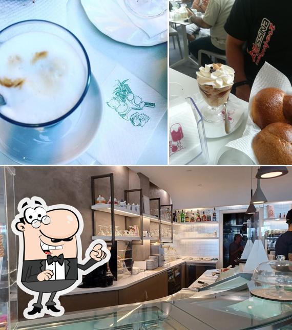 Siediti a un tavolo di Dolce ZEFIRO & ZEFIRO Cafè