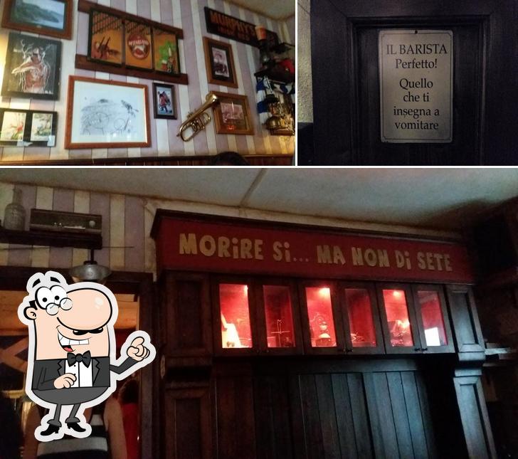 Siediti a un tavolo di Zanzebur's Pub