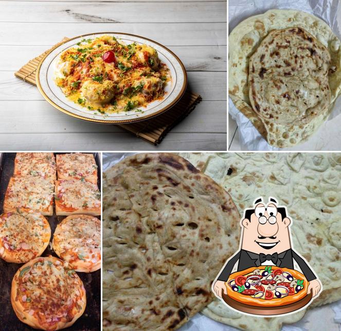 Try out pizza at Roshan Bakery and Restaurant