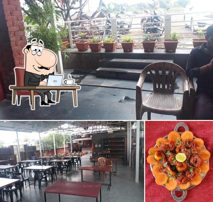 Take a seat at one of the tables at Ashoka Garden Restaurant