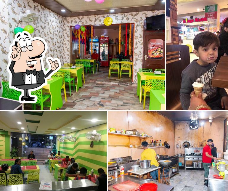 The interior of NEW PIZZA PLANET Best Pizza Restaurant Garhshankar