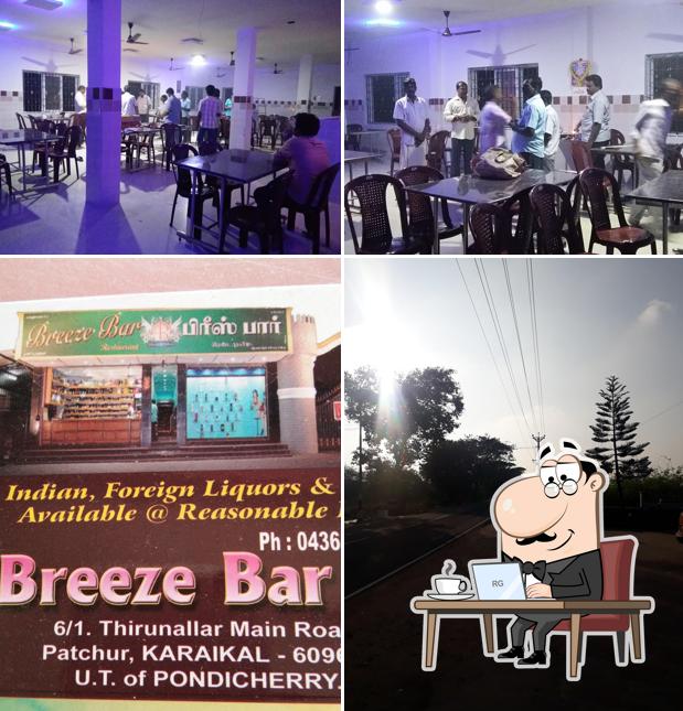 Take a seat at one of the tables at BREEZE BAR