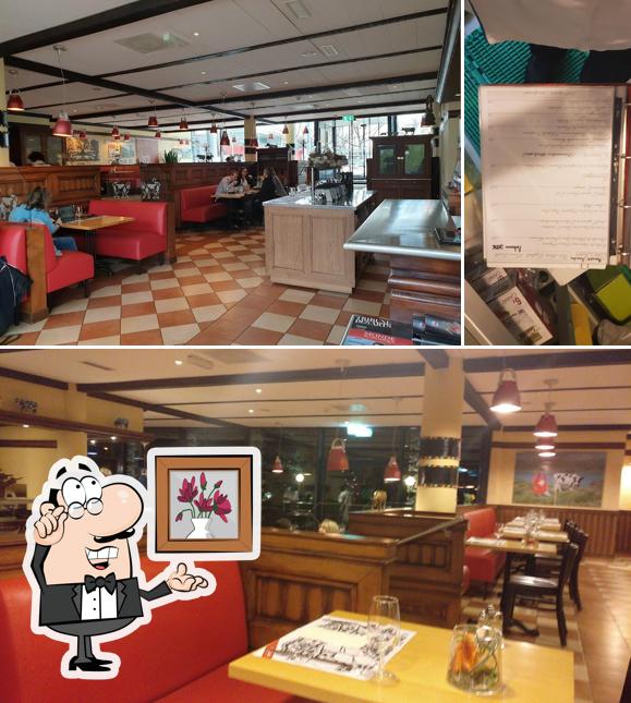 Dai un'occhiata agli interni di Swiss Bistro