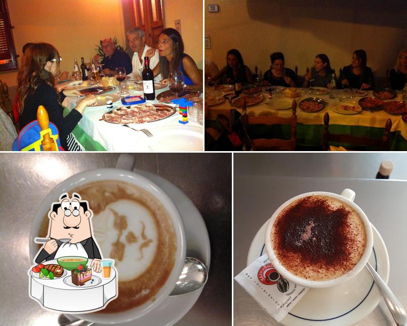 La immagine di tavolo da pranzo e bevanda da Bar Kombriccola