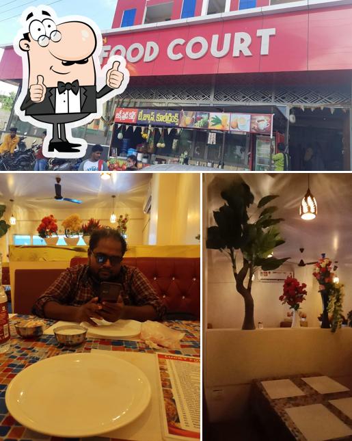 Look at the photo of LUCKY FOOD COURT