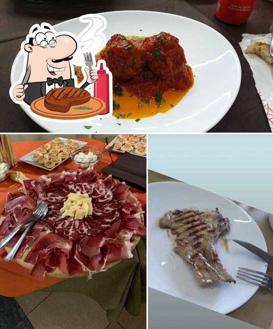 Prenditi i piatti di carne a Pizzeria/Rosticceria "Lo Stadio"