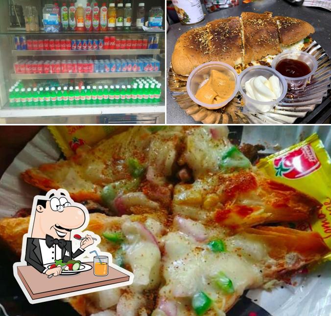 Take a look at the image showing food and beer at Ajay cafe