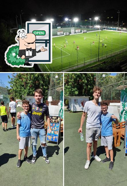 Puoi goderti l'aria fresca da seduto all'esterno di Centro Sportivo Ciriaci