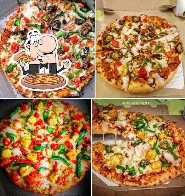 Pick pizza at Domino's Pizza Piplod, Surat