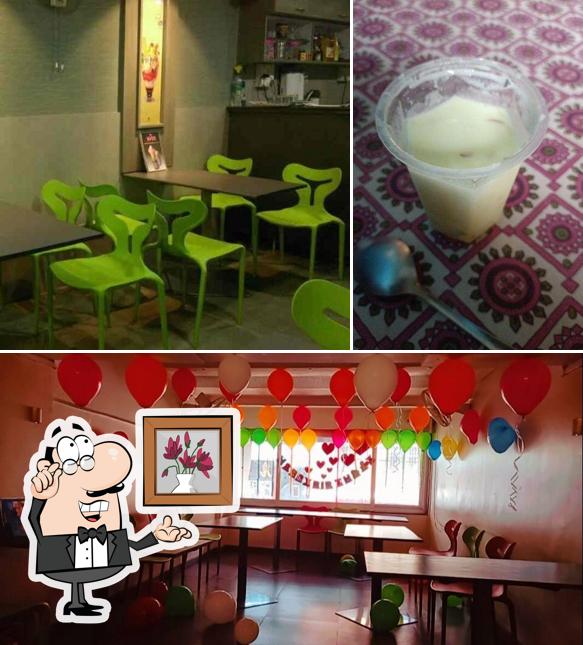 The picture of interior and food at Amey Cold Drink House - Ice Cream & Juice Parlour