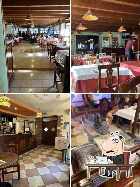 Siediti a un tavolo di Trattoria da Carmela