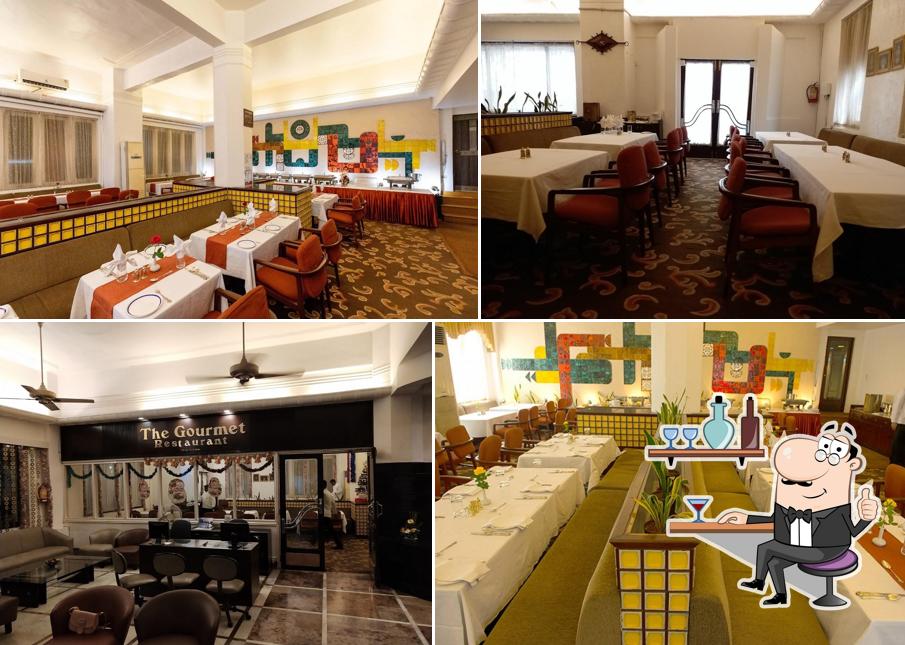 Take a seat at one of the tables at The Gourmet Restaurant