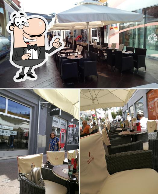 Siediti a un tavolo di caffe bar HUM