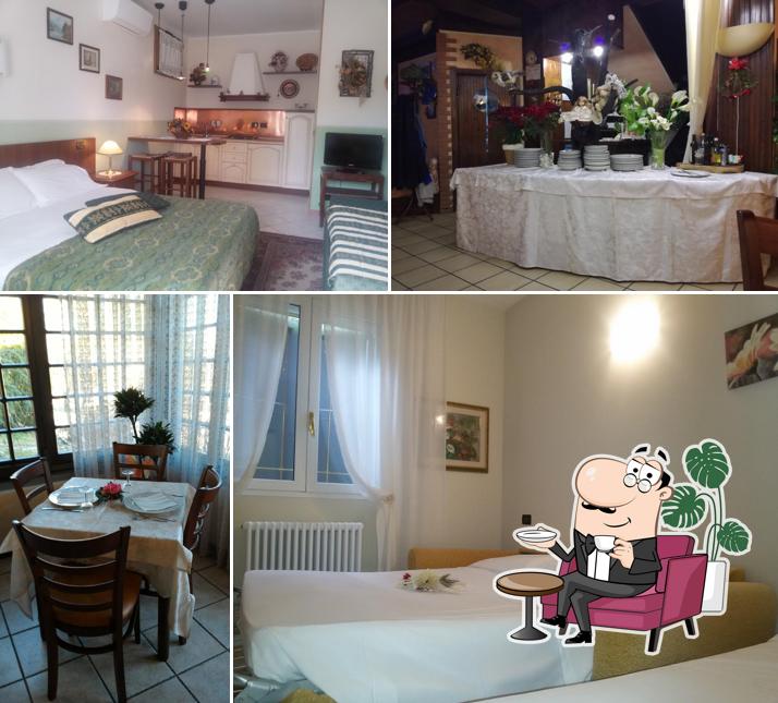 Siediti a un tavolo di Albergo Bruna