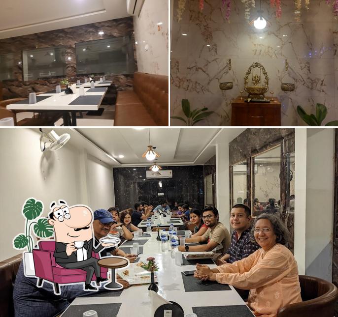 The interior of Prakruthi greenery Restaurant and cafe