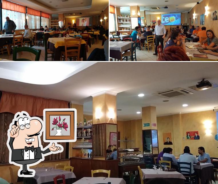 Siediti a un tavolo di Il Cavaliere Ristorante Pizzeria