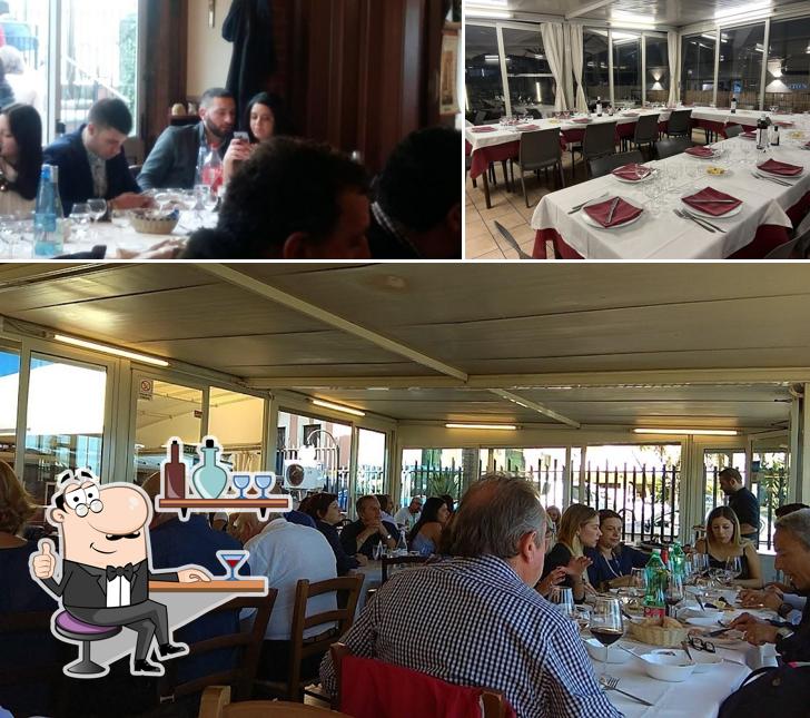 Siediti a un tavolo di Trattoria Porto Nuovo