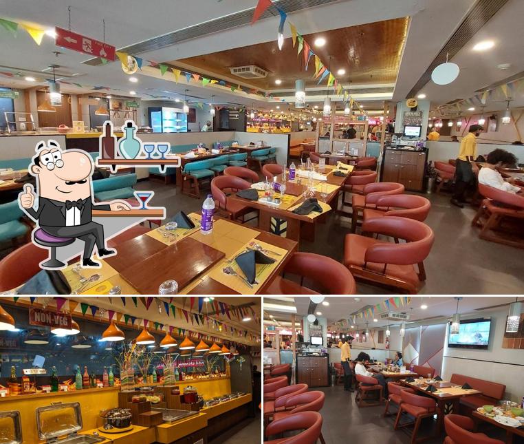 This is the photo displaying interior and bar counter at AB's - Absolute Barbecues Iskon Cross Road, Ahmedabad