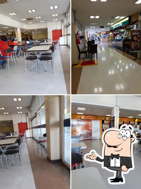Sente em uma das mesas no Giraffas Atacadão Guarulhos