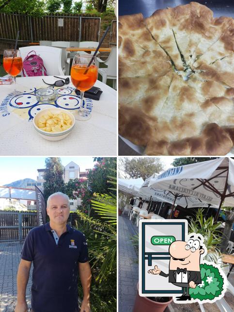 Tra le varie cose da Pista Zero Biergarten si possono trovare la esterno e cibo