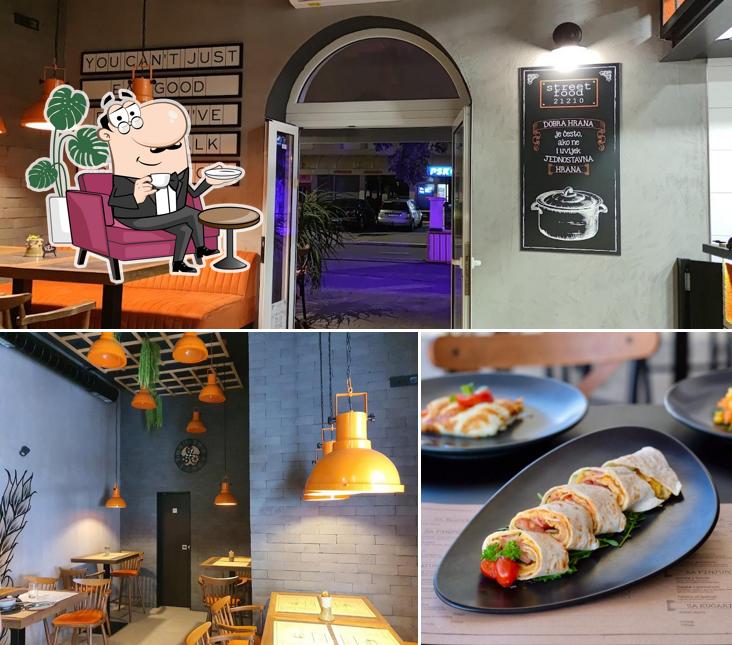 Tra le varie cose da Street Restaurant 21210 si possono trovare la interni e tavolo da pranzo