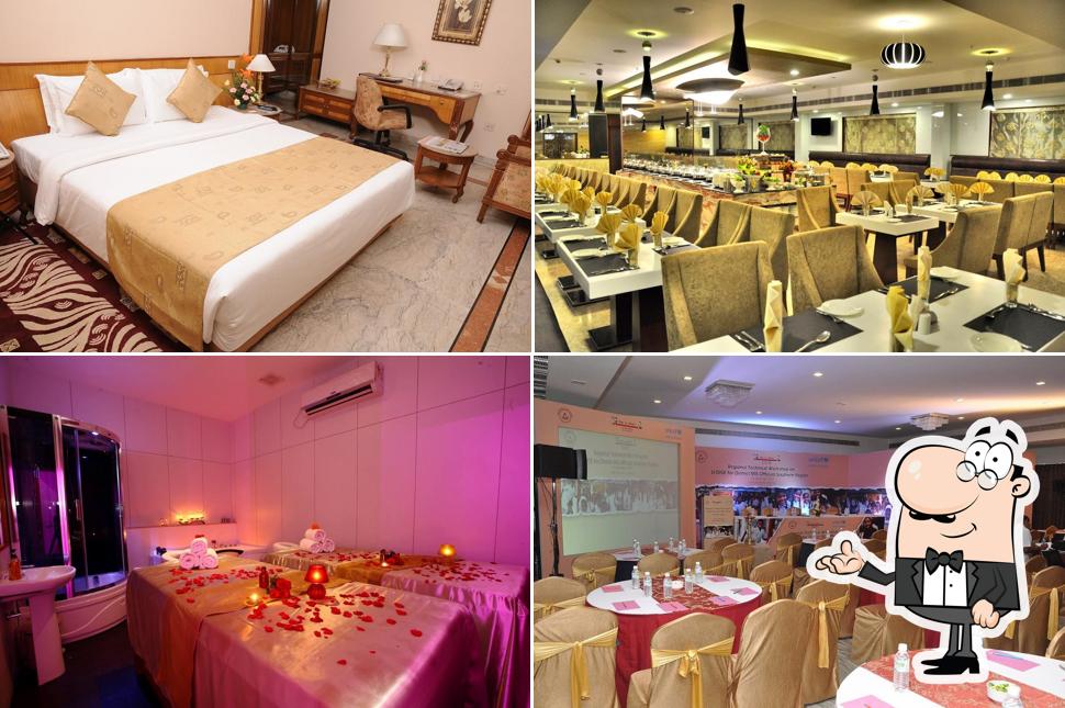 Take a seat at one of the tables at Raj Park Hotel Chennai