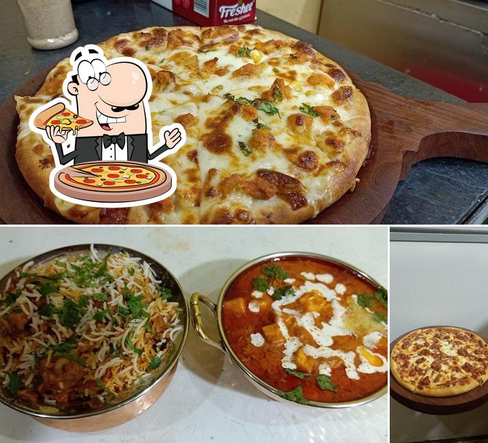 Order pizza at Amigos pizza udala