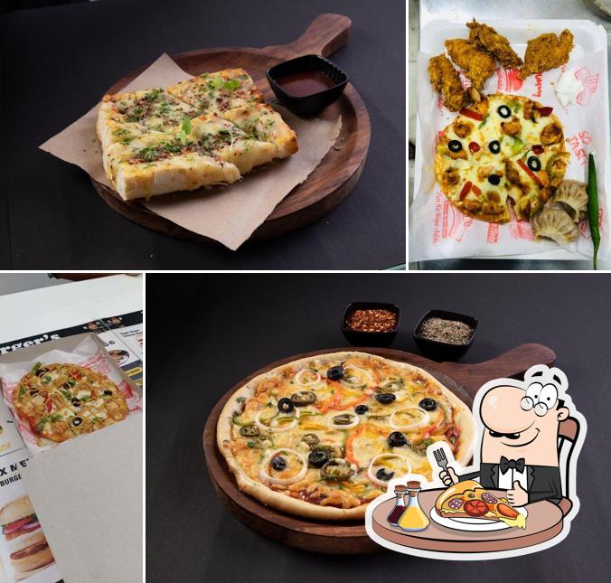 Get pizza at Bombay Burger's Cafe