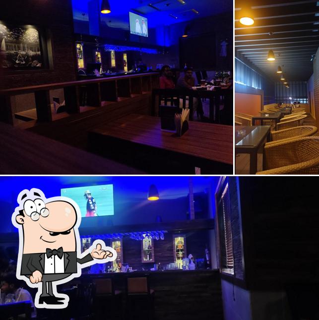 Take a seat at one of the tables at DREMUS Alco Lounge