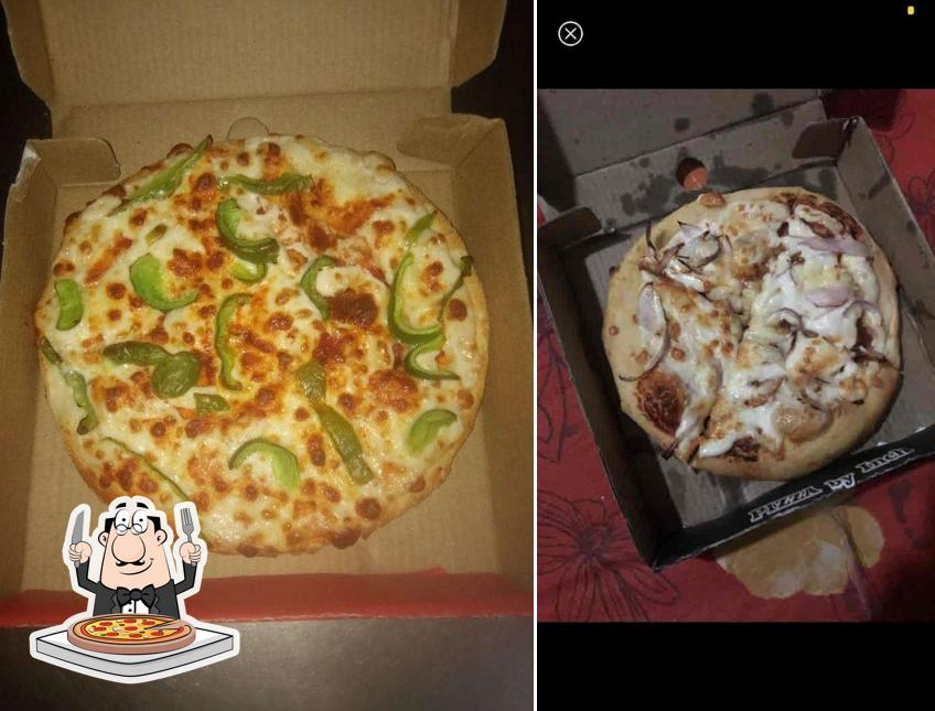 Try out pizza at Pizza by Inch