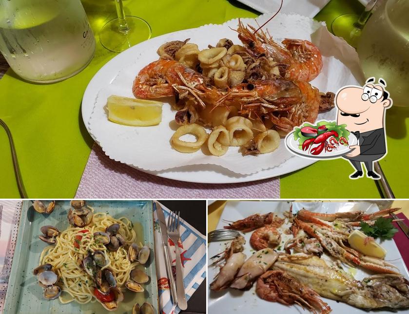 Ordina la cucina di mare a Trattoria Vegia Zena