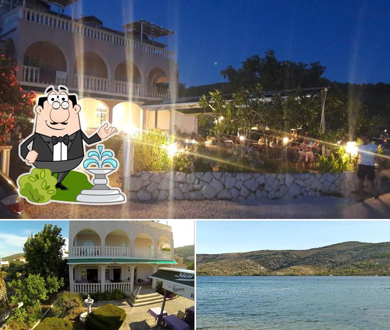 Puoi goderti l'aria fresca da seduto all'esterno di Pansion Kačina