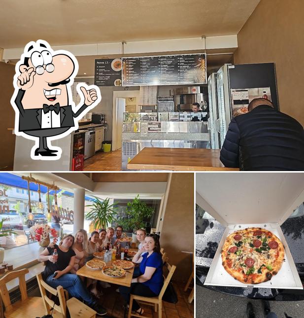 La immagine della interni e pizza di Mr. Piccola Pizzeria