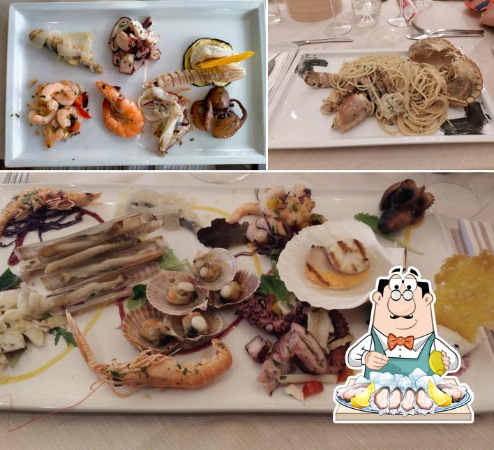 Ordina la cucina di mare a Ristorante con camere da Furia