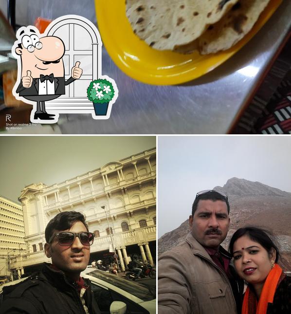This is the image depicting exterior and food at Veg Corner