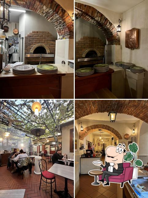 Dai un'occhiata agli interni di Taverna del Pappagallo Ristorante e Pizzeria