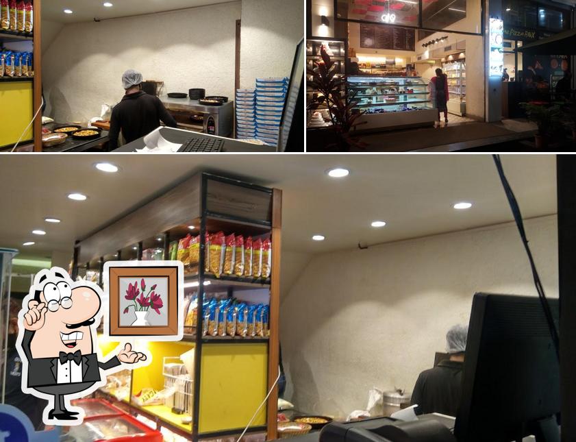 Check out how The Pizza Box & Cafe Sinhagad road Pure Veg looks inside