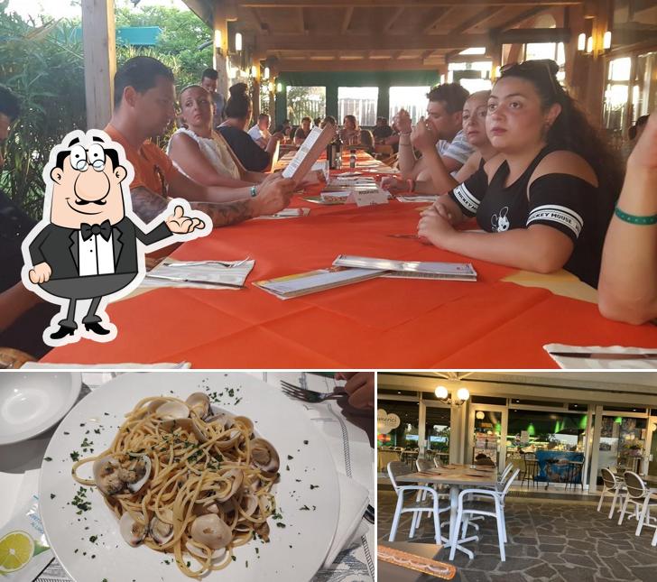 Questa è la immagine che presenta la interni e cibo di Ai Tamerici - Ristorante Pizzeria