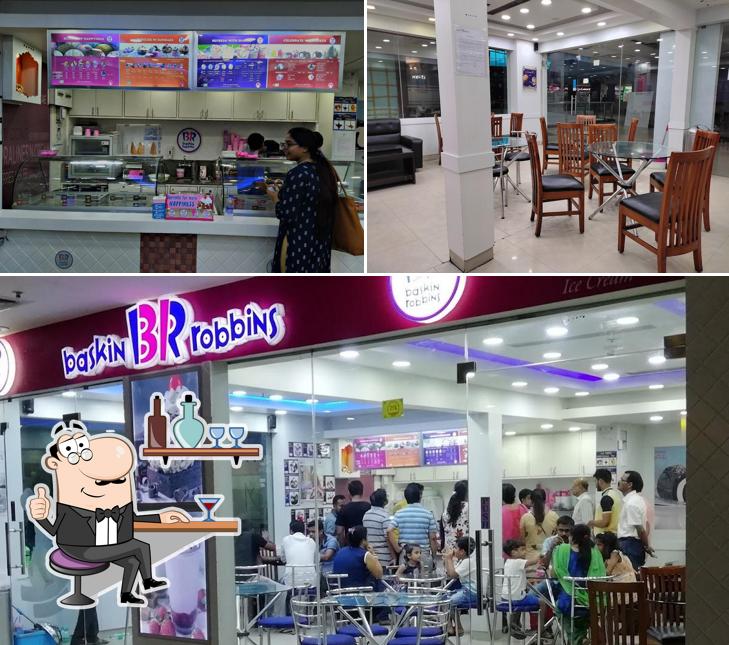 Take a seat at one of the tables at Baskin Robbins