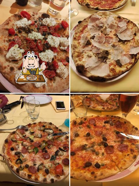 A da Pino Piazza dei Signori, puoi ordinare una bella pizza