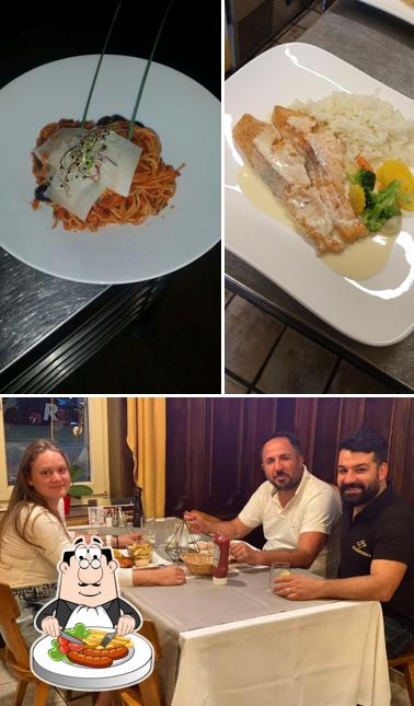 Questa è la foto che presenta la cibo e interni di Restaurant Schmiede