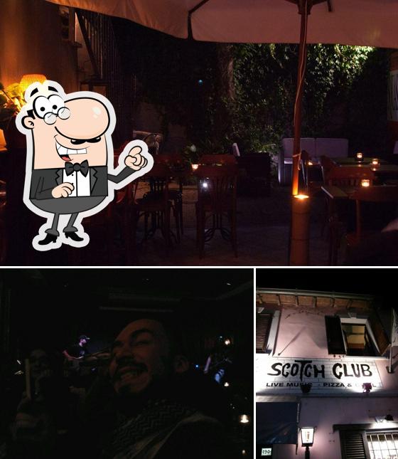 La immagine della interni e bancone da bar di Scotch club