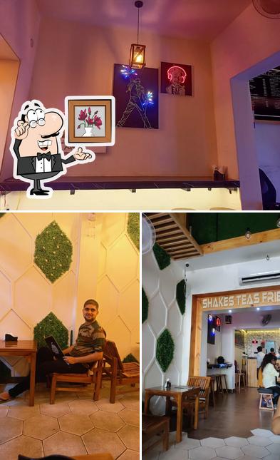 Take a seat at one of the tables at Stf Cafe