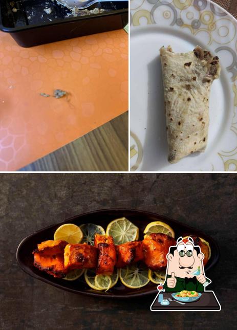 Check out the image depicting food and interior at Koyla Kebab Assagao