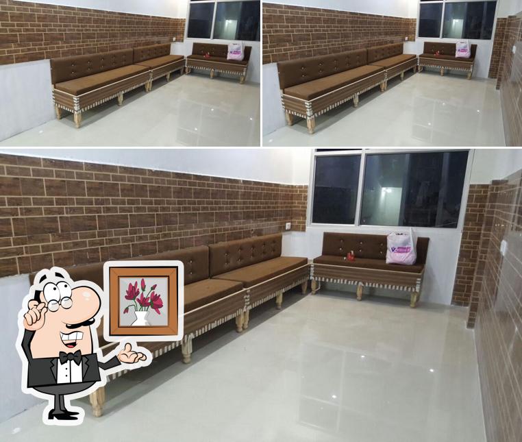 Take a seat at one of the tables at Live kitchen