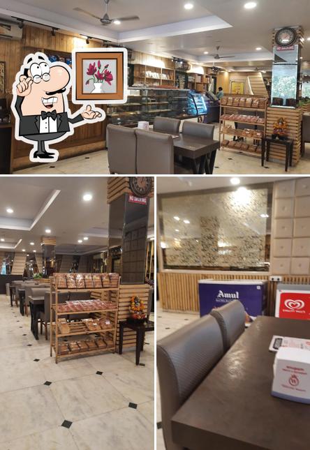 The interior of Anupam Sweets & Restaurant
