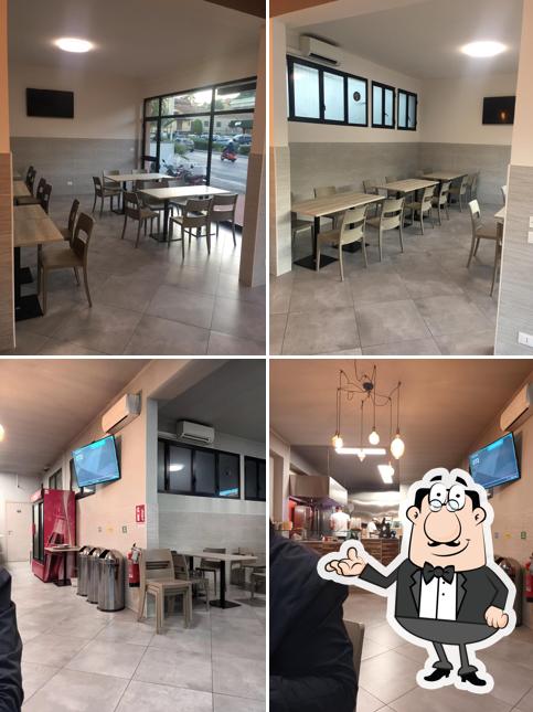 Siediti a un tavolo di Pizzeria Reno